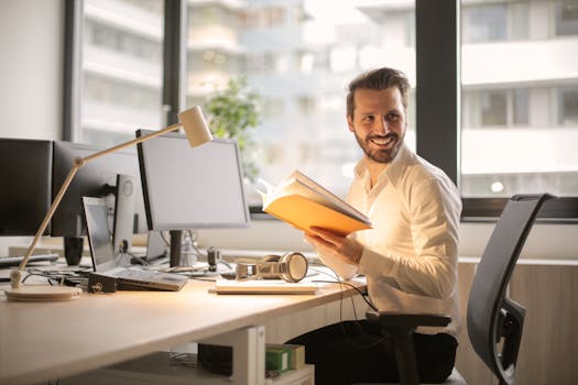 man reading article on a laptop