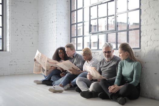 people reading newspapers