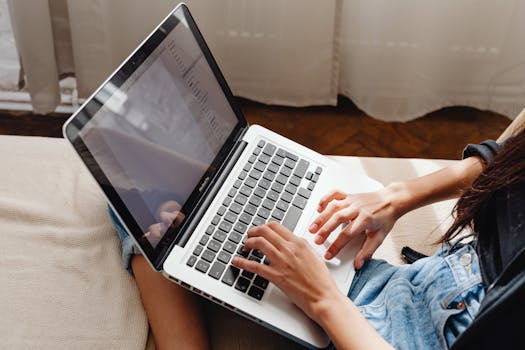 A person researching on a laptop