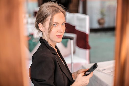 Worried person looking at their smartphone